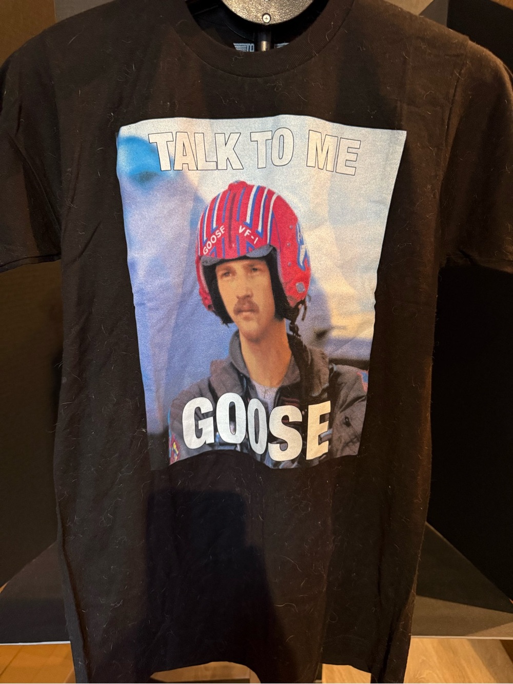 Various tshirts and sizes like Black 'Talk to Me Goose' Graphic Short-Sleeve Tee